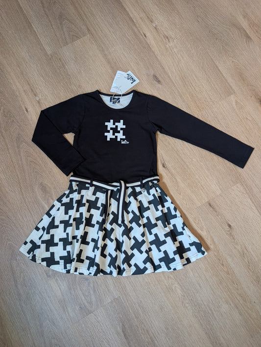 Lofff Pamela girls' long-sleeve dress with black bodice and printed skirt