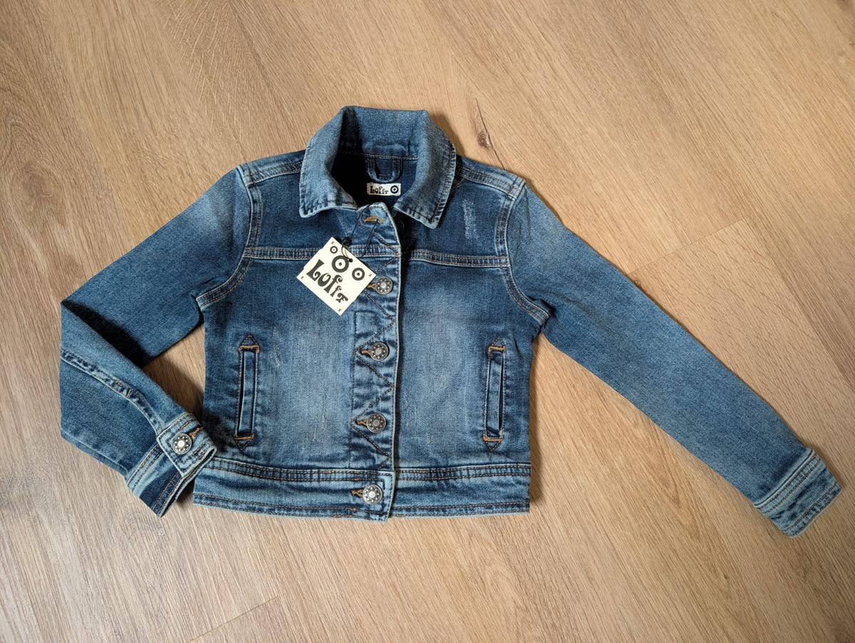Lofff girls' denim jacket in mid-blue wash, laid flat